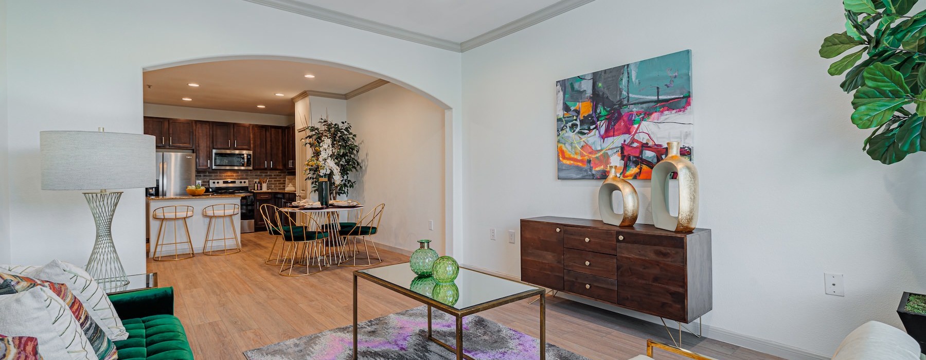 a living room with a couch and a table